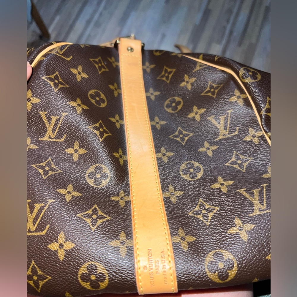 Louis Vuitton Brown and Gold Travel Bag with Iconic Monogram